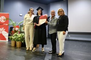 Dra. Edna Benítez, Yomaira Ramos Rosado, Dr. Carlos Sánchez Zambrana, decano y Ana Escobar Pabón, secretaria del DCR.